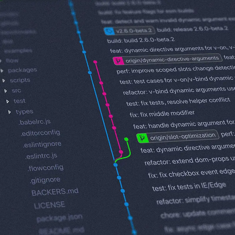 Source code and git commit history on a dark screen