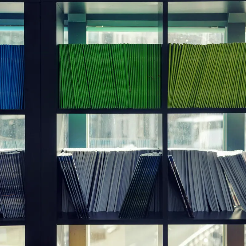 Archived records stored on shelves in an archive